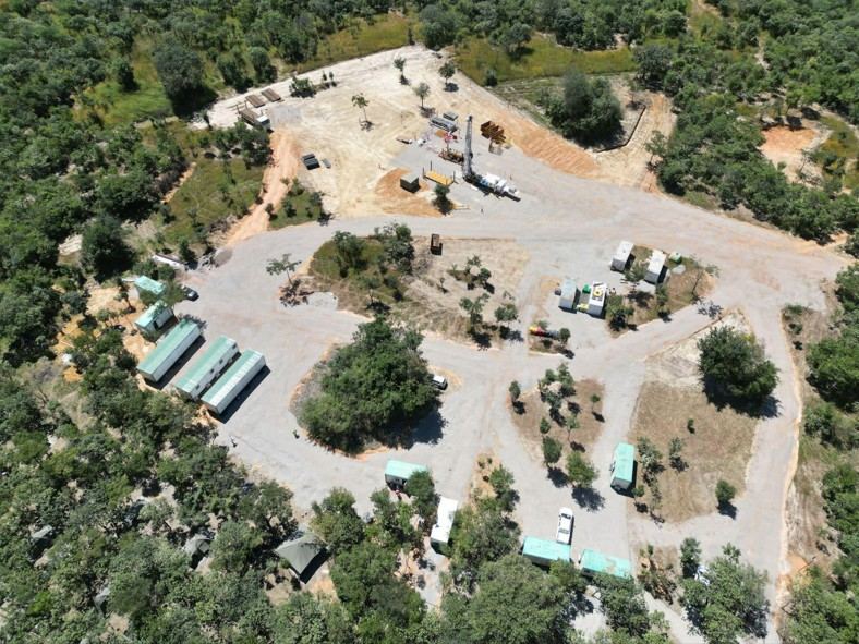 Aerial view of exploration camp and drill pad access road