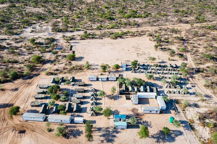 Aerial view of field camp tent rows and support buildings